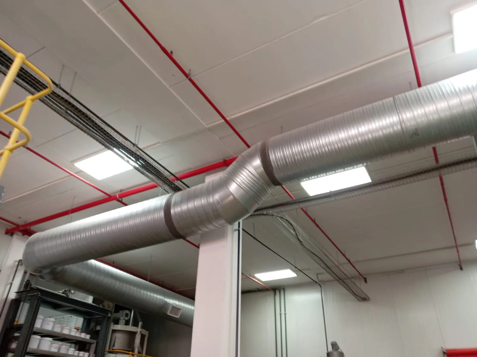 Commercial extractor ducting installed inside a facility