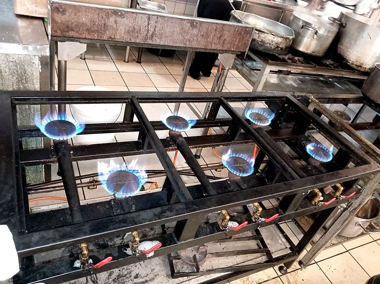 Commercial gas burners operating during service